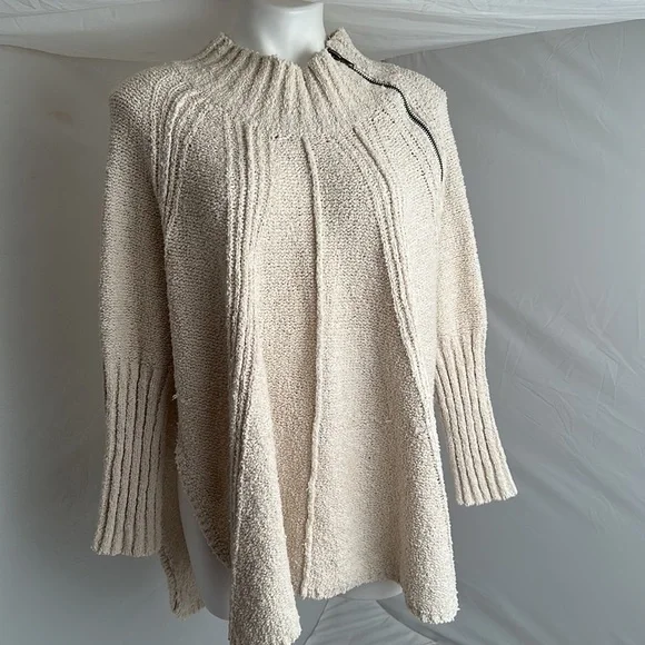 Free People Spin Around Poncho Top in an off-white cream color - Picture 2 of 10